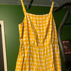 A yellow square romper